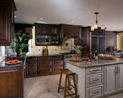 Kitchen cabinets typically take up 50% of your budget and occupy about 40% of the visual space in your kitchen. 25 Remarkable Kitchens With Dark Cabinets And Dark Granite Great Photos Home Stratosphere