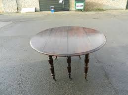 Circular extending dining tables ukfcu routing. Extending Round Antique Oak Table 9ft Round Formed Drop Leaf Extending Oak Dining Table