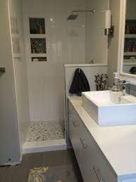 Their color is the same on the face of the tile as it is on the back resulting in very durable tiles that do not show the effects of heavy traffic. Vertical 4x16 Subway Tile With Arabesque Mosaic In Niche Tile Bathroom Vertical Subway Tile Bathroom Hexagon Tile Bathroom