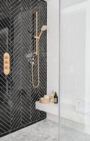 Bathroom with black and gold hardware. Black In The Bathroom