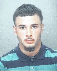 Person charged as accessory to murder