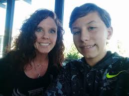 Mike Bina has a sign