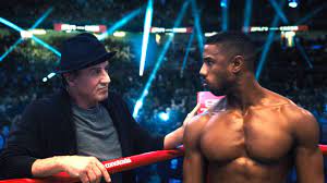 His trunks bear the stars and stripes, but the coloring is muted. Creed 3 Not Bringing Back Sylvester Stallone As Rocky Balboa