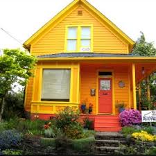 Orange And Yellow House House Paint Exterior Exterior Paint Colors For House Exterior House Colors
