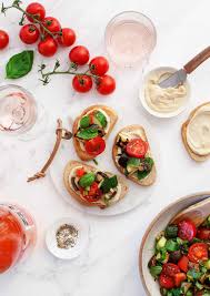 Tomato bruschetta with garlic and basil. 50 Easy Party Appetizers Recipes By Love And Lemons