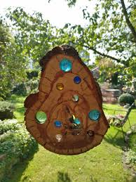 Sonnenfanger Holz Sonnenfanger Mit 16mm Und 25mm Grossen Murmeln Circa 3cm Dicke Holzscheibe Aus Einem Alten Stamm Holz S Murmeln Glasmurmeln Alte Stamme
