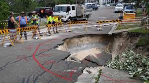 repairs on giant sink hole take shape