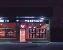 The Roti Hut Menu Specializing In Caribbean Roti Curry And Doubles