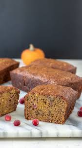 This moist & flavorful orange cranberry bread is packed with orange zest and tart cranberries, topped with cinnamon streusel, and finished with orange glaze. Orange Cranberry Pumpkin Quick Bread Binky S Culinary Carnival