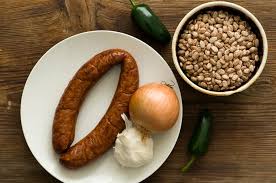 Brown ground beef and sausage. Peppery Pinto Beans With Sausage Homesick Texan