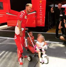 Race driver sebastian vettel was born on the 3rd day of july 1987 at heppenheim in west germany. Sebastian With Kids At Hungaroring Formula1