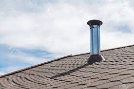 Previous two years dh used a ladder on the roof in order to reach the top of the chimney and get the brush down inside. Chimney Pipe From Stainless Steel On The Roof Of The House Stock Photo Picture And Royalty Free Image Image 83573681