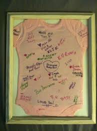 Instead Of A Guestbook At Baby Shower Autograph A Onesie With Fabric Markers Then Frame For Nursery Baby Shower Pictures Baby Shower Funny Baby Shower Camo