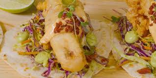 11.99 aussie chicken tacos three grilled chicken tacos topped with crispy slaw, fresh pico de gallo, melted cheese and an herb aioli. Tealeaf Trevally Fish Tacos Fish Of The Day
