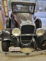 Image result for Fenway Gray 1931 Oldsmobile