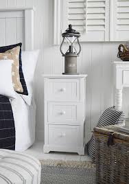 With a simple design, this nightstand will make a versatile piece to your home. Narrow White Bedside Tables New England Bedroom Furniture