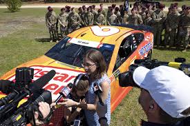 Many nascar tracks use banked turns that are sloped to keep race cars tilted inwards. Driver Unveils New Race Car Honoring Soldier S Memory Family Article The United States Army