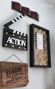 Decorate Your Family Room With Movie Theater Themed Decor For A Fun Mini Theater Room Experience Fun Movie Roo Movie Room Decor Movie Room Movie Theater Decor