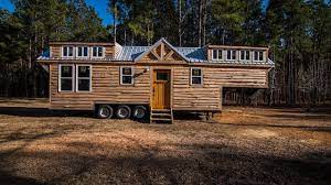A Rustic Tiny House Built Onto A 39 Gooseneck Trailer With Two Bedrooms A Full Kitchen And A Living Tiny House Trailer House On Wheels Tiny House On Wheels