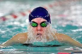 New Canaan captures girls FCIAC swimming title