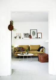 Serene Scandinavian Apartment With A Touch Of Nature Deco Maison Deco Salon Decoration Salon Canape Jaune