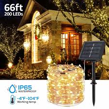 A string of solar christmas lights uses a small solar panel for power; Christmas Led Outdoor Solar String Lights For Bushes Ip65 Waterproof Warm White Overstock 29017342