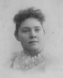 This lady her name was Evelyn Thorne she came down from Chapel or Norman's  Cove to Winterton to marry a Reuben read and the little girl sitting  alongside of her was just