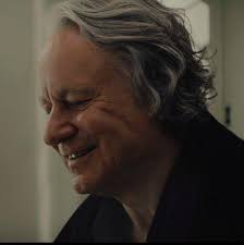 Is Axel's smile off-putting to others?