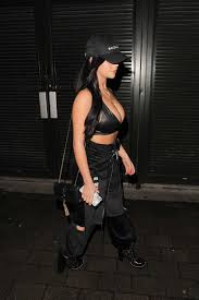 Demi rose kisses on of the martinez brothers djs as she dances on stage burning man in mirrored head piece. Demi Rose Mawby And New Boyfriend Dj Chris Martinez Arrives In Matching Outfit At Fabric Club In London 280118 13