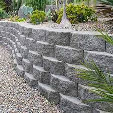 Retaining walls allow you to manipulate the land, sculpting steep slopes into sections of level ground that increase the visual appeal of your yard. Retaining Wall Blocks Landscape Walls Rcp Block Brick