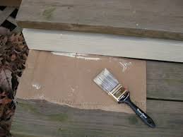 The removal of the home's brick chimney made way for a curved and illuminated back deck, accessible from both the living room and the master suite. How To Paint A Wood Deck Or Front Porch We Did Subtle Stripes Young House Love