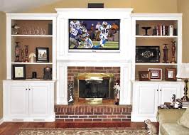 The modern fireplace cabinets combine heating and decorative needs. Fireplace Cabinets Built In Wall Units Bookcases Around Fireplaces