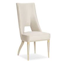 Try dining armchairs with curved shapes, scrolled details, and classic straight arms, then complete the set with matching side chairs. Dining Chairs Caracole