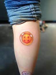 These tattoos have the standard character of the dragon ball with its hair standing on end, eyes wide with amazement and a pose that suggests that it's forever ready for action. Dragon Ball Dragon Ball Tattoo Tattoo Designs For Women Dragon Tattoo Designs