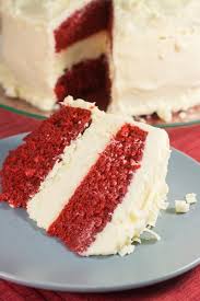 A red velvet cake is instantly recognizable with its bright red color offset by a white cream cheese frosting. Decadent Red Velvet Cheesecake Favesouthernrecipes Com