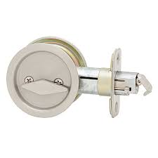 The lock comes in a circular design and offers a very small opening for where the lock opens and closes. Weiser 1031 Satin Nickel Round Pocket Door Privacy Lock The Home Depot Canada