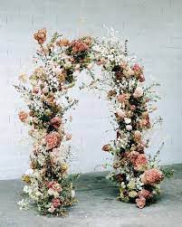 The flowery and flowy arch. 48 Gorgeous Ideas To Set Up A Wedding Backdrop Dried Flowers Wedding Wedding Arch Flowers Floral Arch Wedding