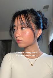 Mastering the Perfect Messy Bun with Curly Hair