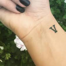 Couple tattoo ideas, couples, date tattoo, matching tattoos, roman numerals, wrist. Wrist Tattoo Of The Number Five In Roman Numerals On