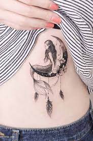 Über 7 millionen englischsprachige bücher. The Guide To Any Feather Tattoo Of Your Choice Mom Tattoos Mermaid Tattoos Body Art Tattoos