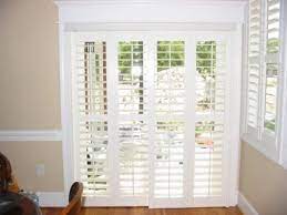 Budget blinds provides custom plantation shutters for your home in either real wood or faux wood. Kitchen Sliding Door Curtain Ideas Patio Door Coverings Kitchen Sliding Doors Door Coverings