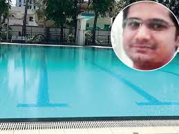 Swimming coach dies in AMC pool