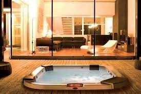 spa jacuzzi santorini encastre dans une terrasse en bois jacuzzi interieur jacuzzi jacuzzi exterieur