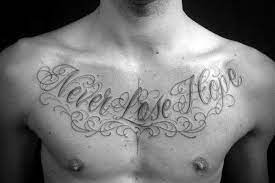 50 Chest Quote Tattoo Designs For Men Phrase Ink Ideas Tattoo Quotes Inspirational Tattoos Tattoo Designs Men