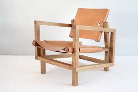 Italian designer, sizable organic lounge chairs, beige sheepskin, wood, 1940s. Leather Lounge Chair Voukenas Petrides