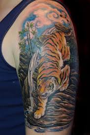 Asian body art on sleeve, arm, chest, forearm, back, shoulder, and leg #tattoos #tattoosforguys #tattoosformen #tattooideas #tattoodesigns. Full Back Traditional Japanese Tiger Tattoo
