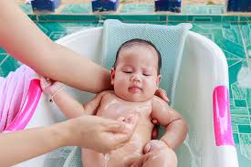 How much water should i put in the tub? How To Hold A Baby 8 Safe Positions With Pictures