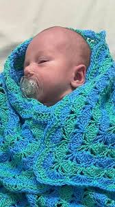 Hi, wanting to crochet a baby blanket with this yarn, its 4 ply, very  light, any pattern ideas?