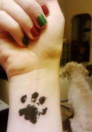 40 Amazing Dog Paw Tattoo Design Ideas Pawprint Tattoo Paw Tattoo Pretty Tattoos For Women