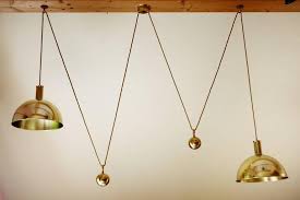 This pendant is combined with a weight and 3 wall clips allowing for installation in ceilings. Double Posa Counterweight Pendant Lamp By Florian Schulz At 1stdibs